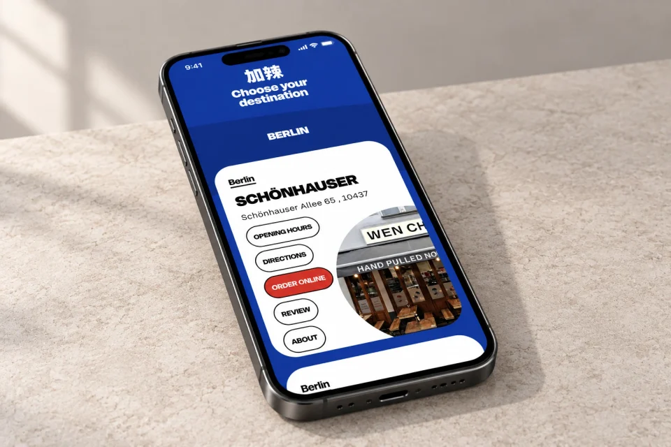 An angled phone mockup showing the Berlin restaurant finder and Schönhauser location card.